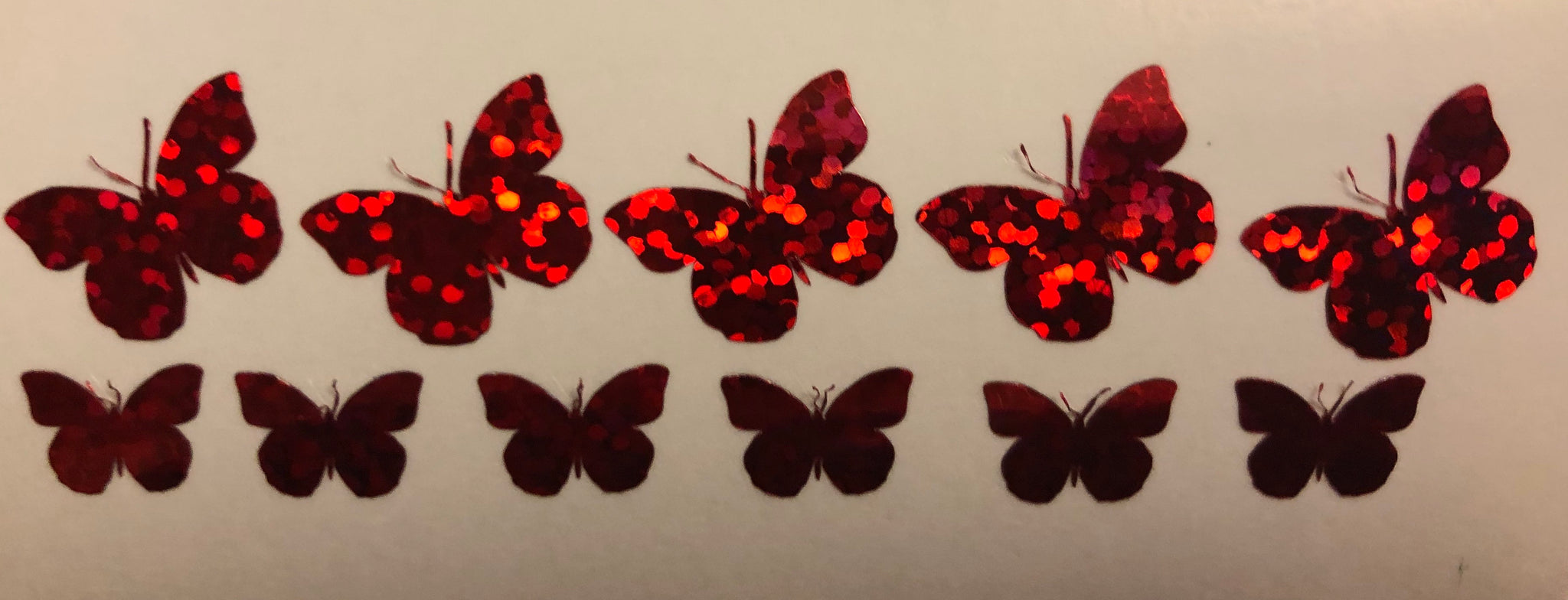 Red holographic butterflies